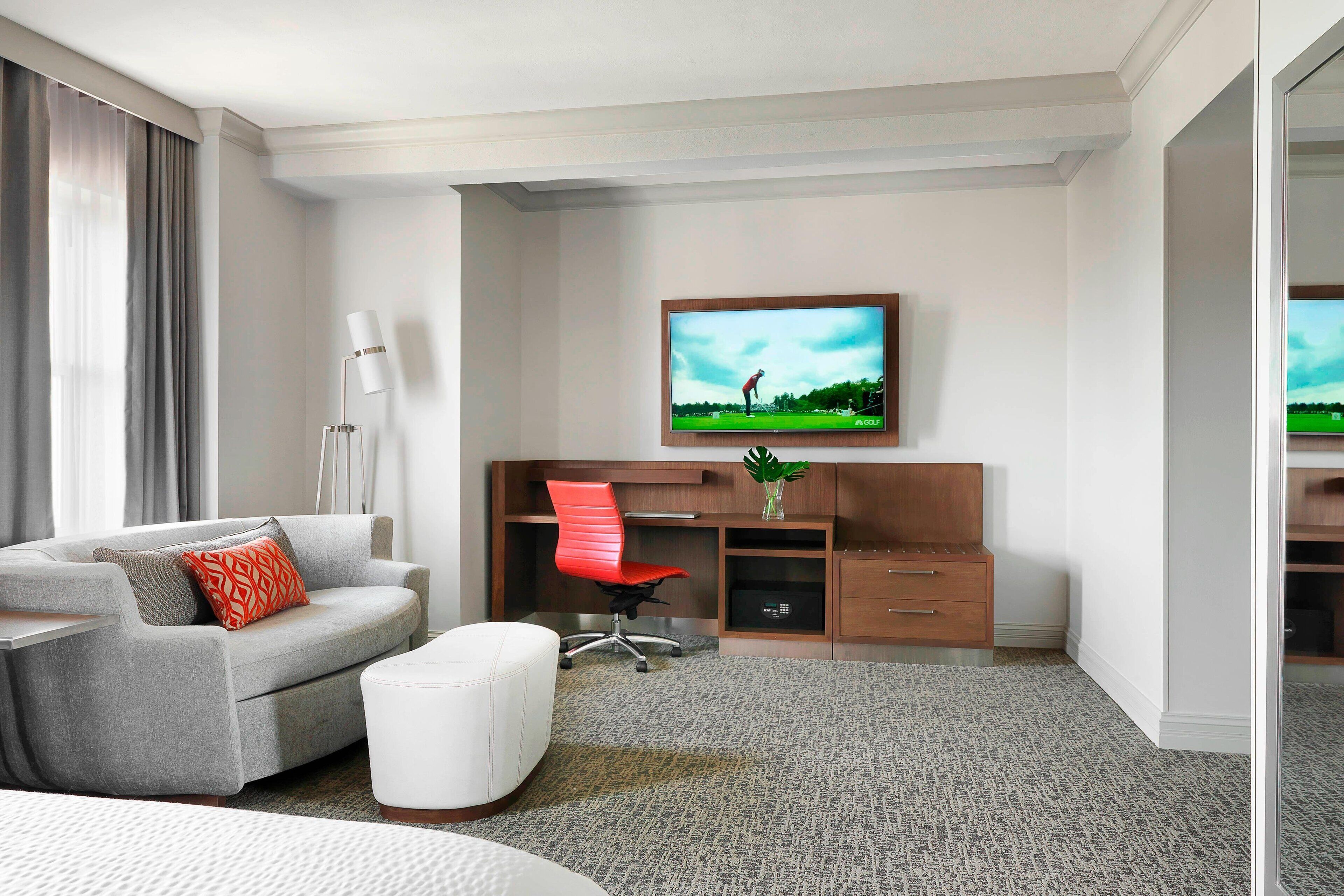 Guest room with golf on TV